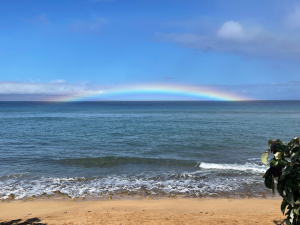 Hawaiian beach with rainbow.