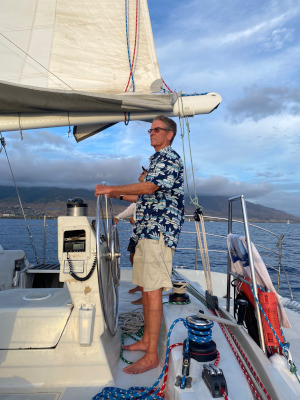 Jim steering sail boat.